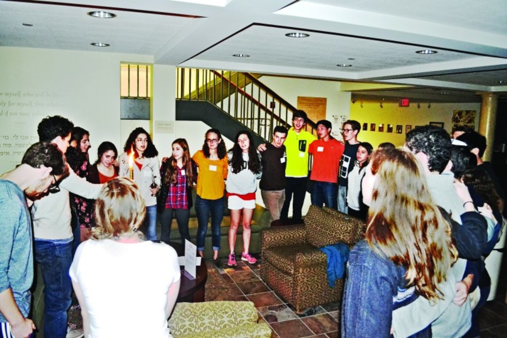 Students participate in havdalah at Brown RISD Hillel. /Brown RISD Hillel